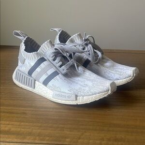 Adidas NMD Glitch Camo Sneakers
Running sneaker